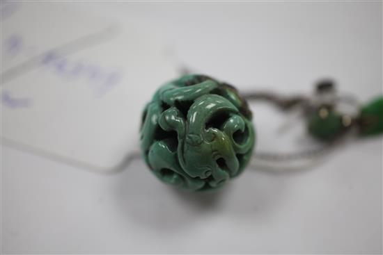 A Chinese turquoise bead, late 19th / early 20th century, 4.7cm